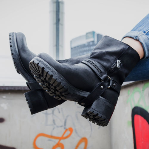 Stylish but clunky black leather boots with a chunky heel.