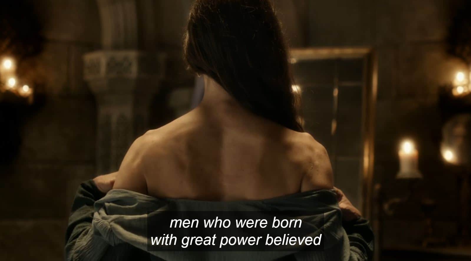 A shot of Moiraine from the back pulling on her shirt, with the text over it "men who were born with great power believed"